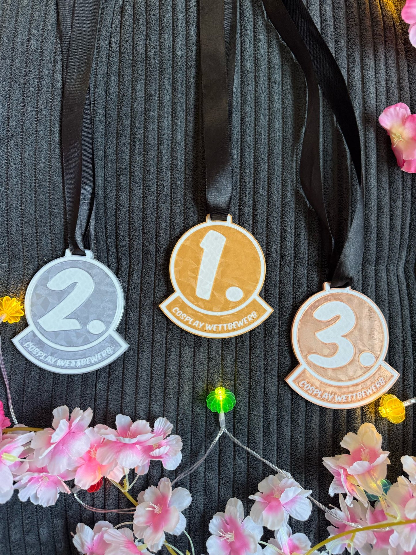 Medaillen in Gold, Silber und Bronze